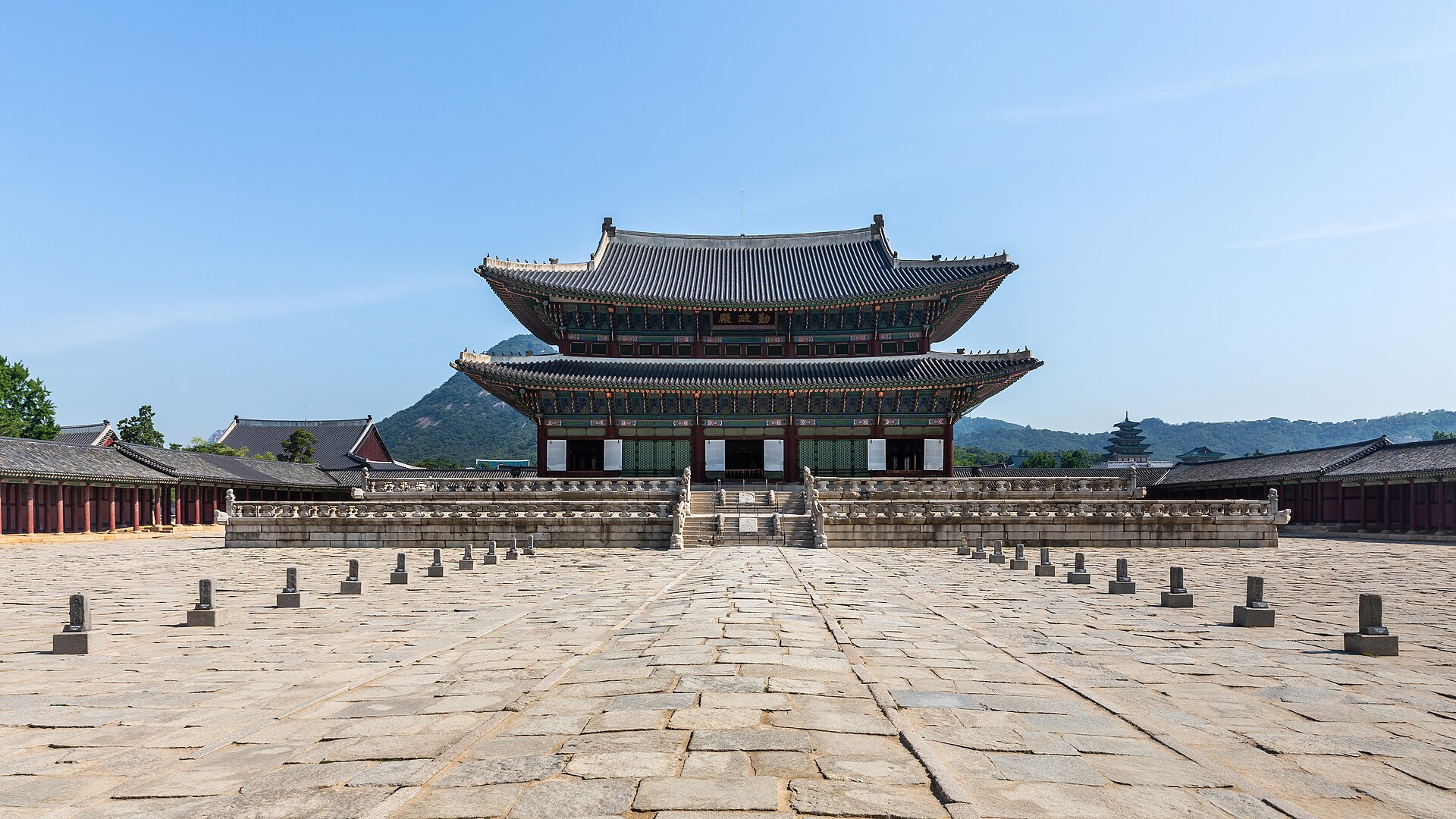 Geunjeongjeon Hall at Gyeongbokgung Palace under bright blue sky